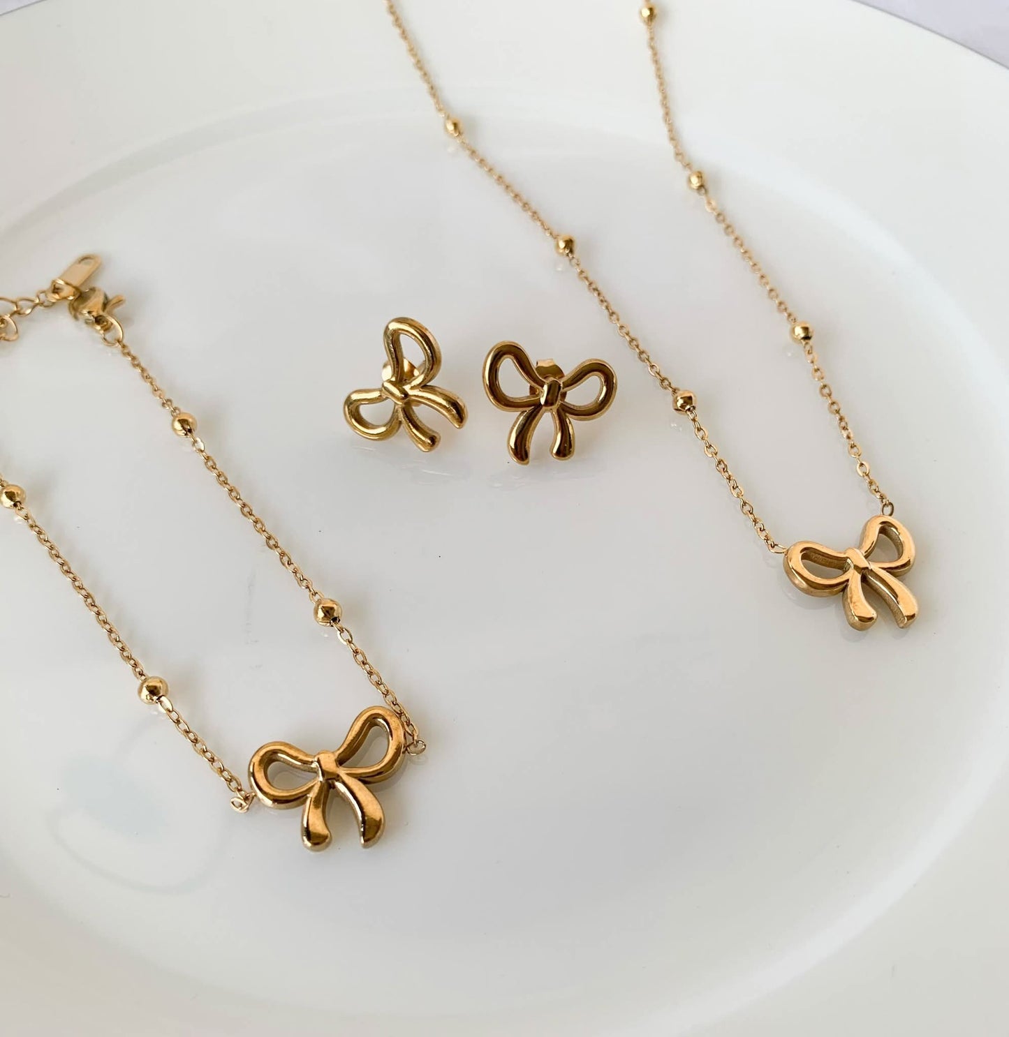 Minimalist Gold Plated Stainless Steel Bow Shaped Locket Earing Set